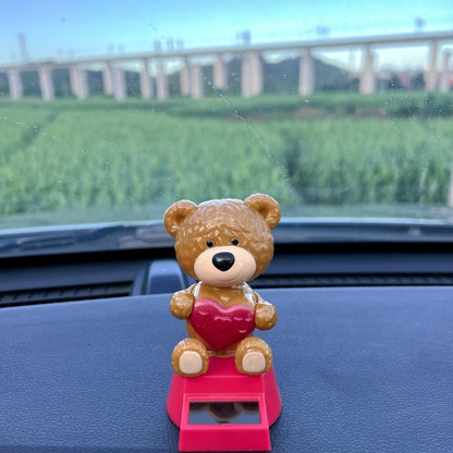 ตุ๊กตาหน้ารถ พลังงานแสงอาทิตย์ หมีน้อยน่ารัก ร่างกายจะแกว่ง ตกแต่งคอนโซล ตกแต่งรถยนต์