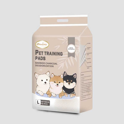 Bamboo charcoal dog pee pads. Absorbent. Helps with potty training. Odor absorbing and eliminating.